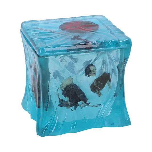 A blue translucent cube encases two small skeleton figures, resembling trapped creatures. It has a distorted texture and features a red symbol on the top, creating a mysterious atmosphere.