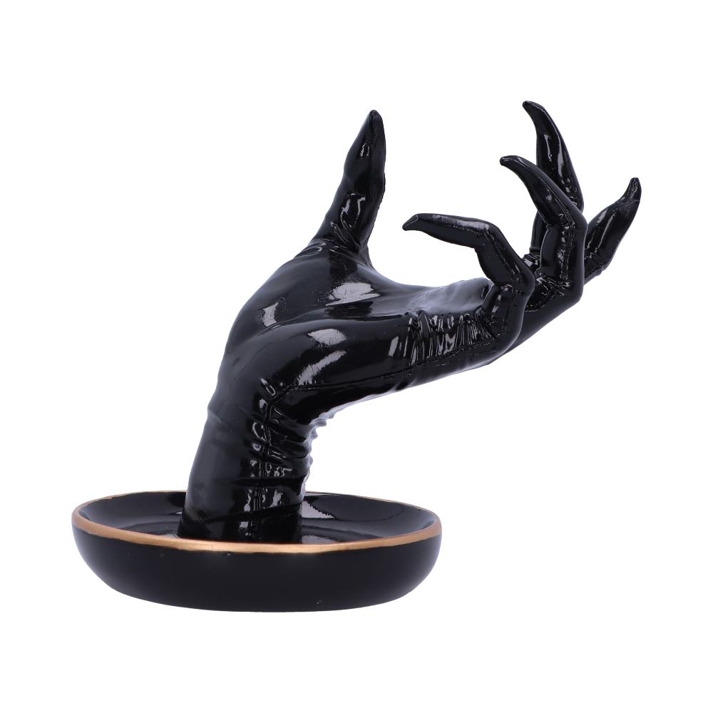 A glossy black hand sculpture emerges from a small round base, with fingers elegantly curling upwards, set against a plain white background.
