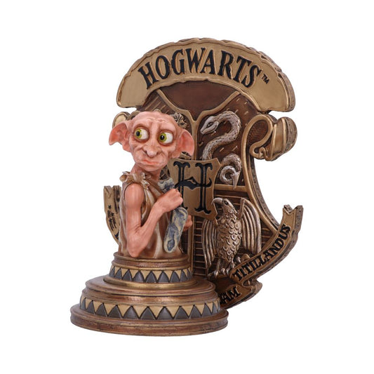 A detailed sculpture of a small, large-eyed creature holding a sock, stands proudly against a decorative backdrop featuring the Hogwarts crest. The text reads "HOGWARTS," "DRACO DORMIENS NUNQUAM TITILLANDUS."