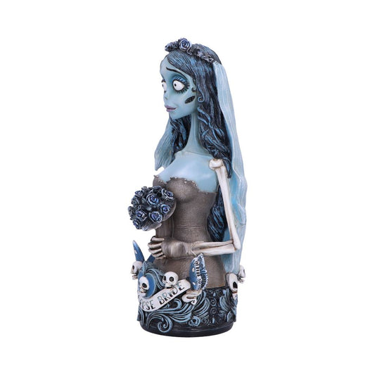 A figurine depicts a skeletal bride holding a bouquet, adorned in a tattered gown with blue accents. The base features skull motifs and the text "CORPSE BRIDE."