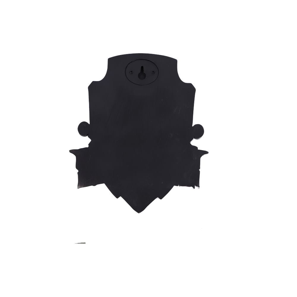A black, ornate, shield-shaped plaque remains static with a keyhole-shaped cutout near the top, set against a plain white background.