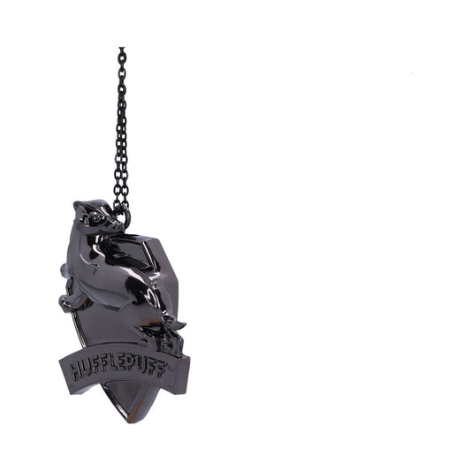 Pendant of a stylized animal (possibly a badger) with the text "HUFFLEPUFF," hanging from a black chain against a plain white background.