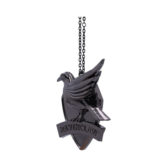 A black pendant features a stylized raven perched on a shield with the text "Ravenclaw." The pendant hangs from a black chain against a plain white background.