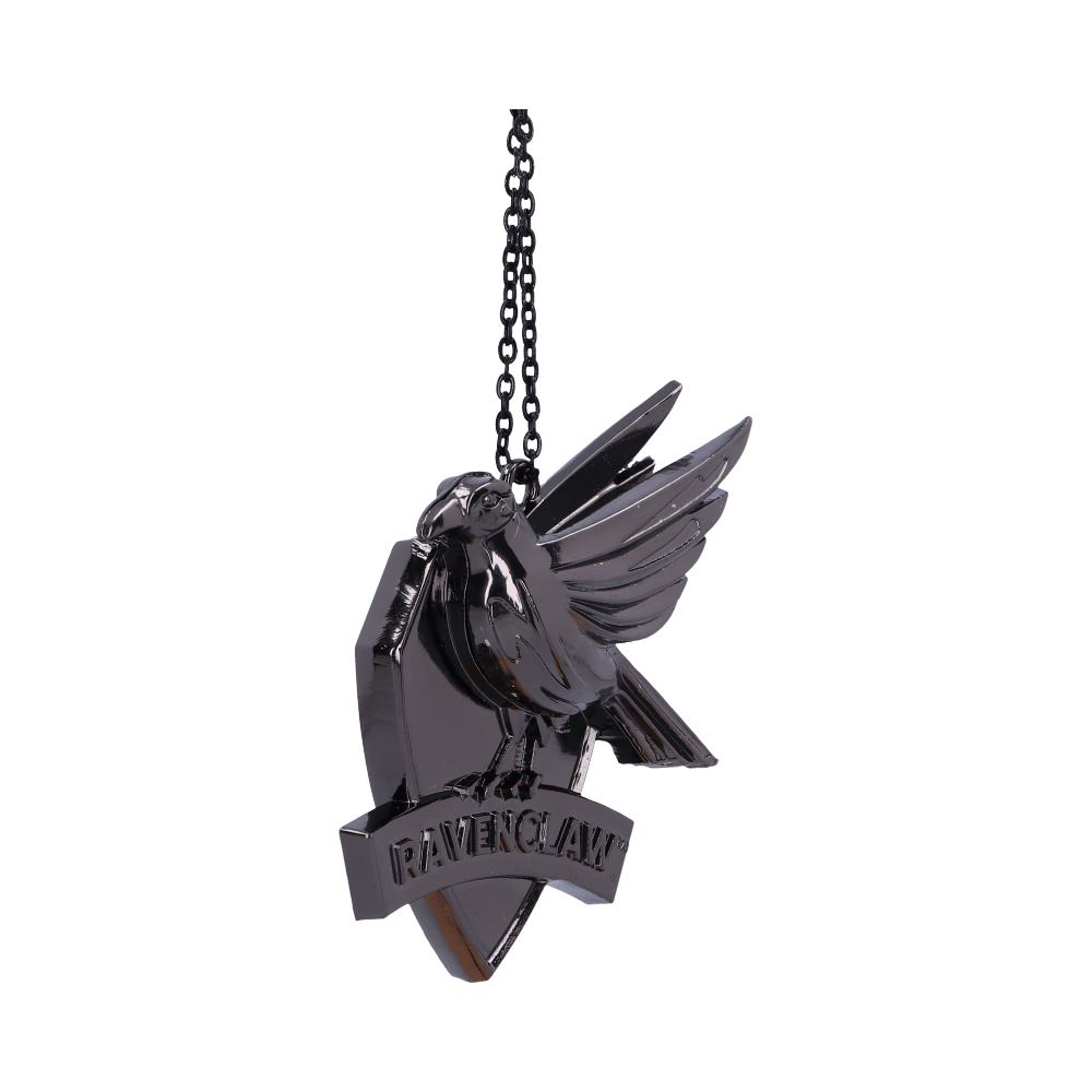 A shiny black raven pendant hangs from a chain. The bird is in a flying pose, attached to a shield with the text "RAVENCLAW" written across it.