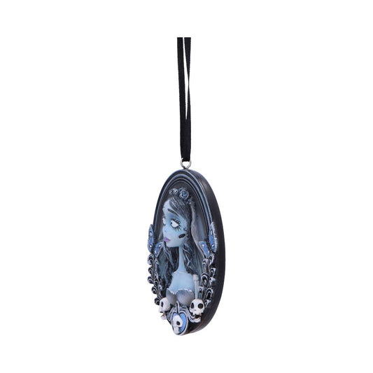 A hanging black oval pendant features a relief of a woman with long hair and flowers, surrounded by skulls and butterflies, suspended by a black ribbon.