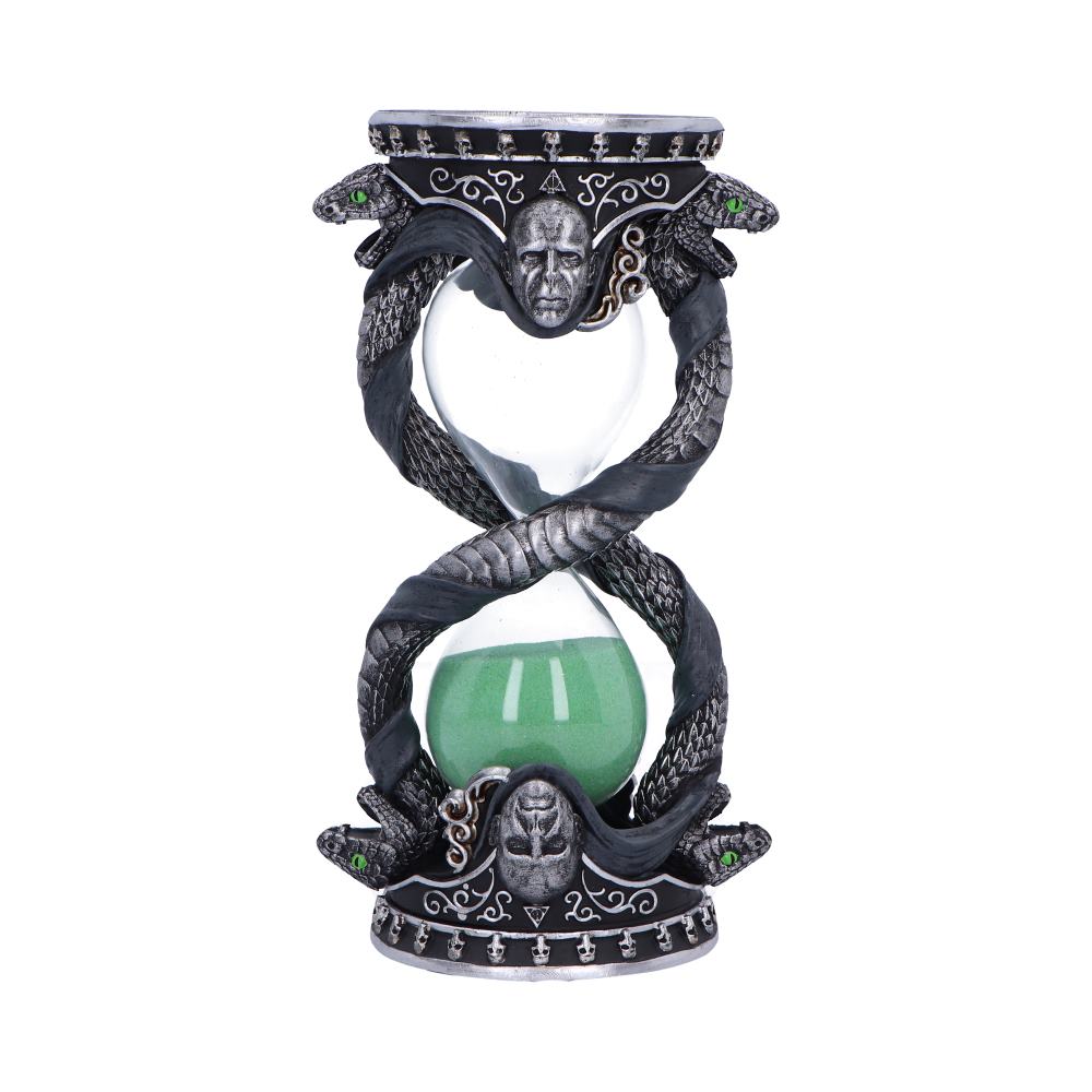 Hourglass with green sand, entwined by serpent designs and carved faces, set against a detailed gothic-style frame.