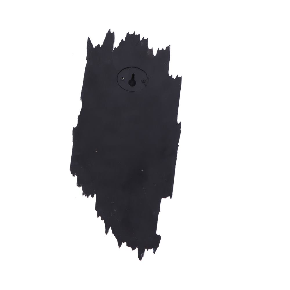 A jagged, irregularly shaped black object hangs against a white background, featuring a single round keyhole at the top center.