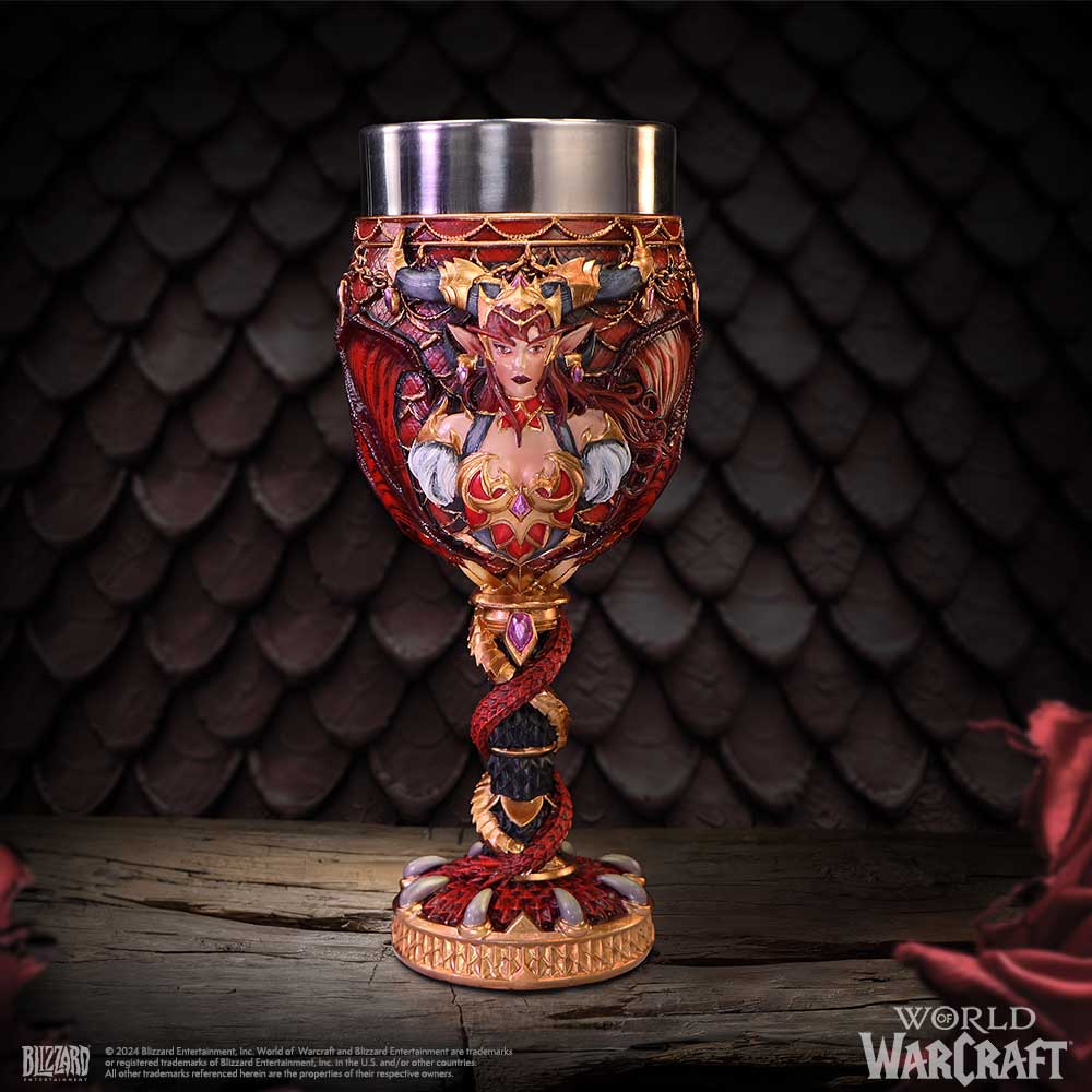 Ornate chalice sculpted with a horned red-armored demoness, gem accents and a serpent-entwined stem stands on a cracked wooden table against a dark dragon-scale backdrop; text: © 2024 Blizzard Entertainment, Inc. World of Warcraft and Blizzard Entertainment are trademarks or registered trademarks of Blizzard Entertainment, Inc. in the U.S. and/or other countries. All other trademarks referenced herein are the properties of their respective owners. WORLD OF WARCRAFT BLIZZARD