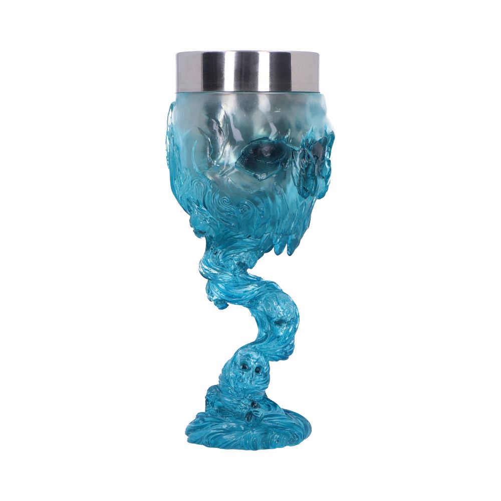 A light-blue skull-shaped goblet, with a swirling stem, sits on a white background. The top is a metallic rim.