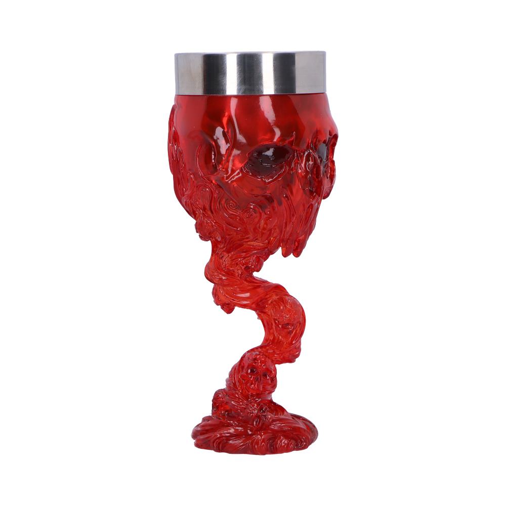 A red skull-shaped goblet, with a metallic rim, sits on a white background. The stem is sculpted like a flowing stream of liquid.