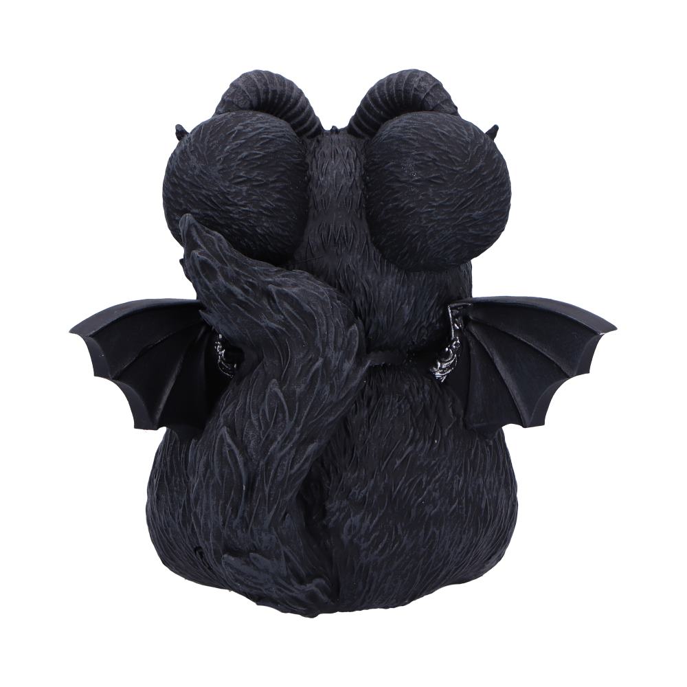 A black, textured figurine with curled horns, closed eyes, tail, and wings is seated, creating an appearance reminiscent of a mythical creature, isolated against a plain background.