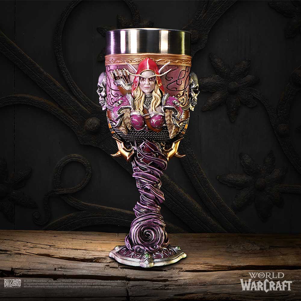Ornate goblet features a sculpted female elf in a red hood flanked by skulls, twisted purple stem and metal rim, placed on a wooden plank against a dark carved backdrop; text: BLIZZARD, WORLD OF WARCRAFT