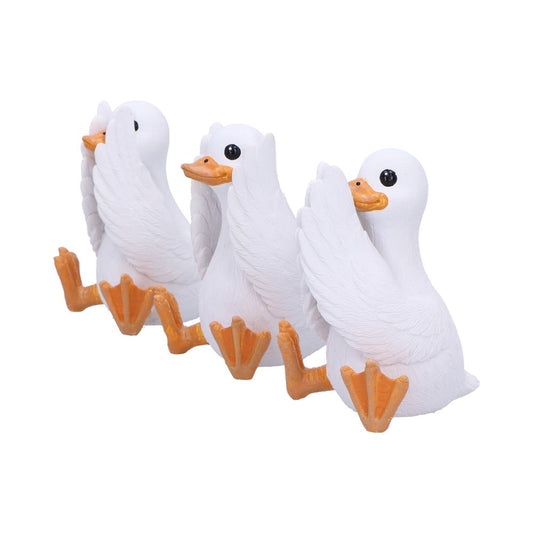 Three white duck figurines raising wings while sitting in a row on a plain white background, each with orange beaks and webbed feet and glossy black eyes.