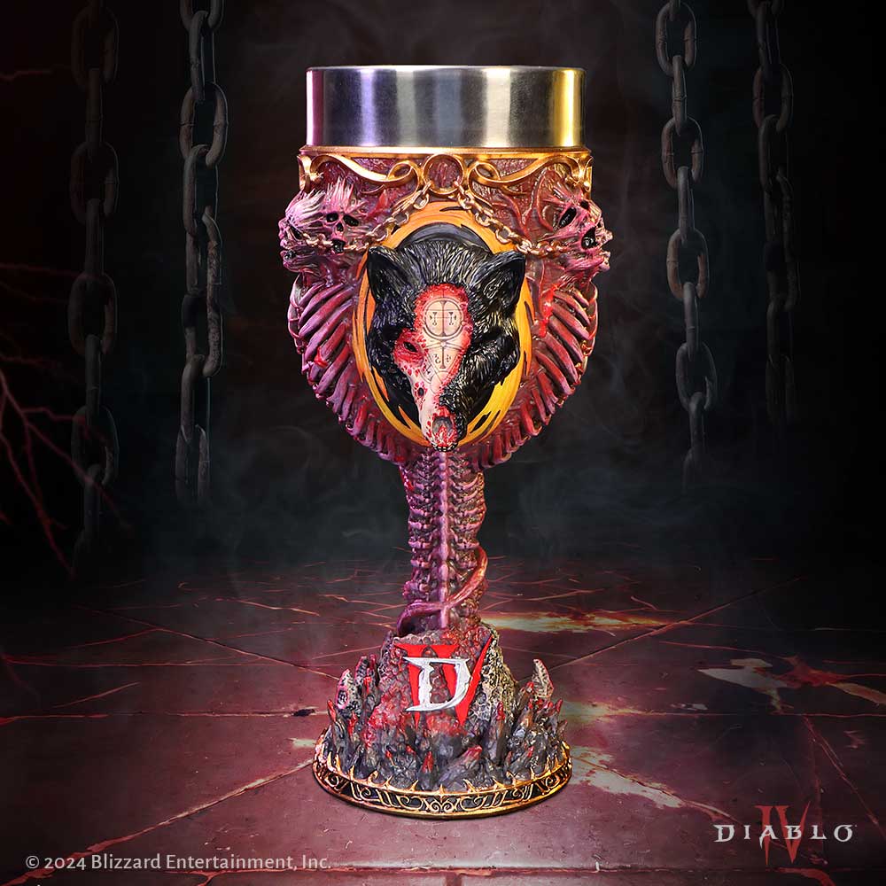 Ornate sculpted chalice featuring a black wolf skull and exposed vertebrae stands on a cracked stone floor amid hanging chains and smoke, text: © 2024 Blizzard Entertainment, Inc.; D; DIABLO IV