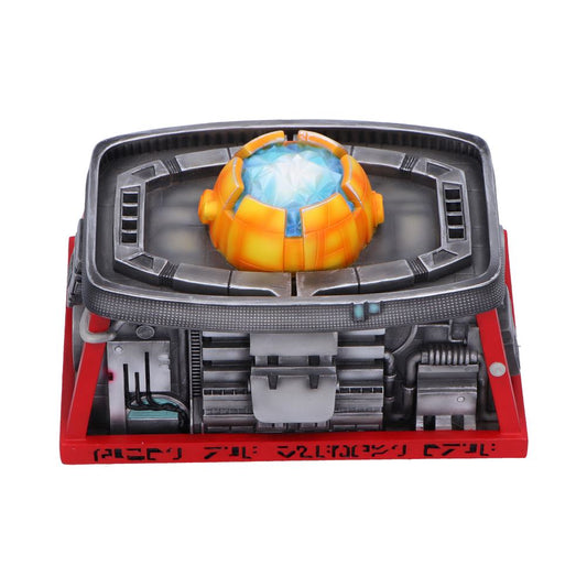 Orange segmented dome rests centered inside a metallic rectangular platform on a red mechanical base with visible vents and wiring, text on front: "PIECEY ZIL SOLIDCRY CTL"