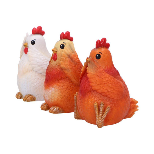 Three plump hen figurines stand in a row, two orange and one white, each with raised wings and bright red combs against a plain white background.