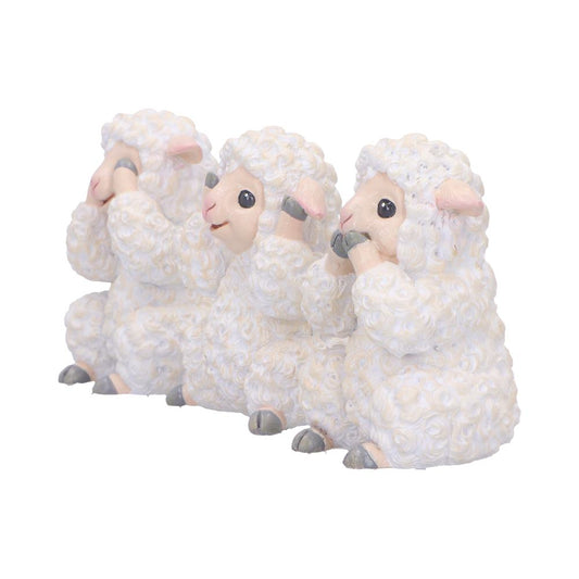 Three small white sheep figurines sit side by side, one covering its eyes, one covering its ears, one covering its mouth, photographed on a plain white background.