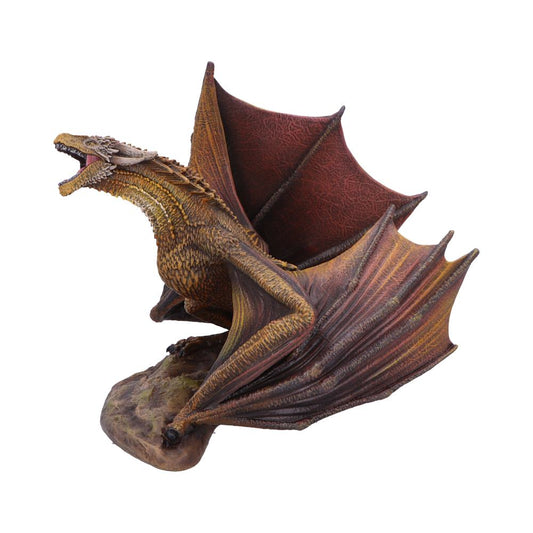A brown and reddish dragon sculpture stands on a rocky base, mouth open in a roar, wings unfurled and textured, showing a scaly body and detailed claws.