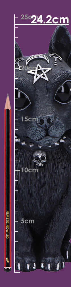 Black ornamental cat statue sits facing forward adorned with a metal pentagram and skull collar against a purple background with a vertical ruler marked 5cm 10cm 15cm 20cm 24.2cm 25cm and a pencil labeled NEMESIS NOW LTD