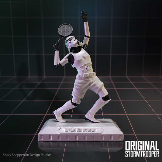 A stormtrooper figurine strikes a tennis-serve pose holding a racket on a display base in a neon grid room; Base reads "Original Stormtrooper"; ©2025 Shepperton Design Studios; ORIGINAL STORMTROOPER