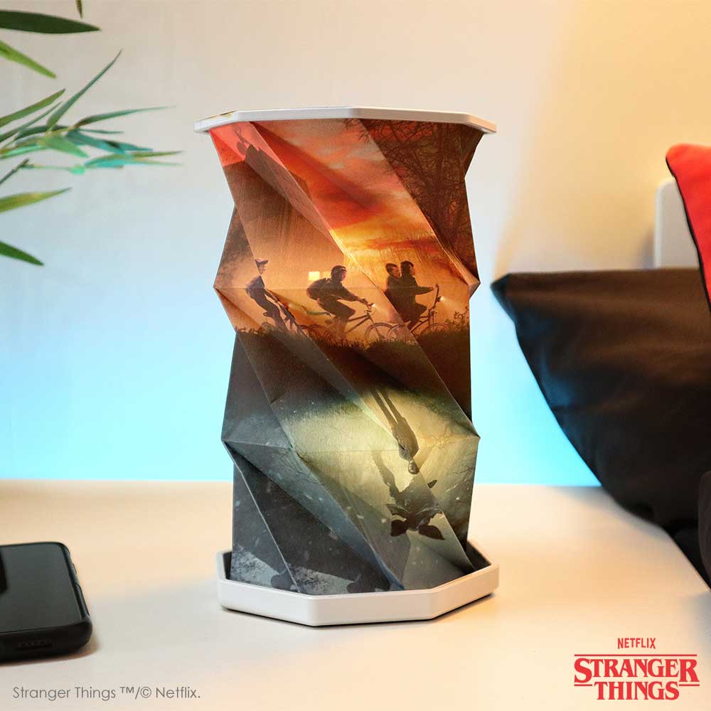 Stranger Things Upside Down lamp illuminated on a table