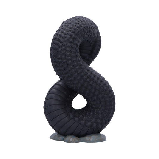 A black-scaled serpent sculpture coils into an S-shaped loop, resting on small flat stones against a plain white background.