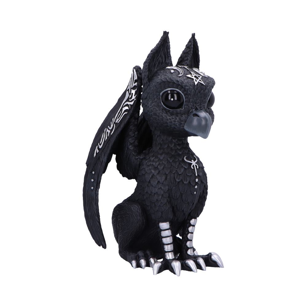 Black griffin figurine sits upright, displaying large glossy eyes, silver beak and talons, engraved wing designs and a star and crescent on its forehead, textured feather body on white background.