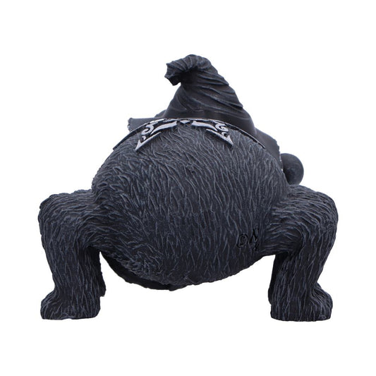 Dark gray gnome figurine crouches belly-forward with pointed hat and textured fur on a white background Text: DN