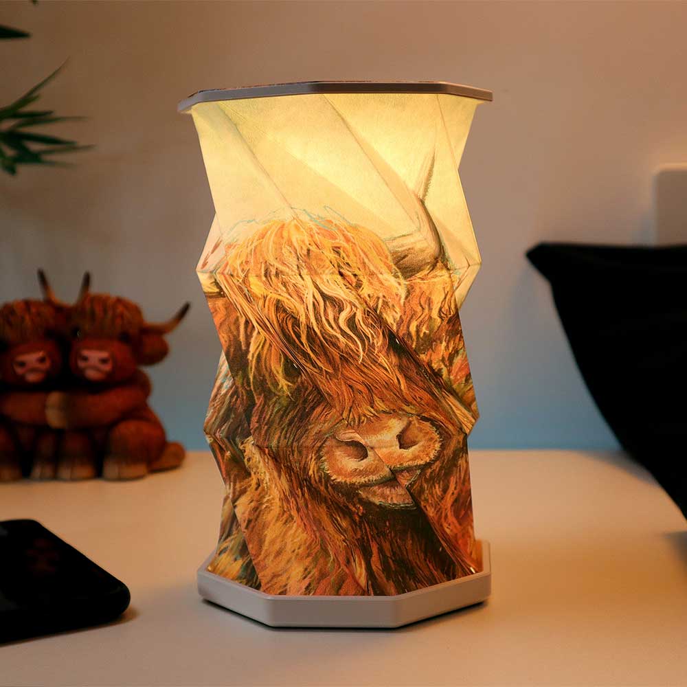 Highland Cow Foldable Lamp foldable LED lamp with Highland cow artwork, USB-C rechargeable and touch-activated ambient lighting.