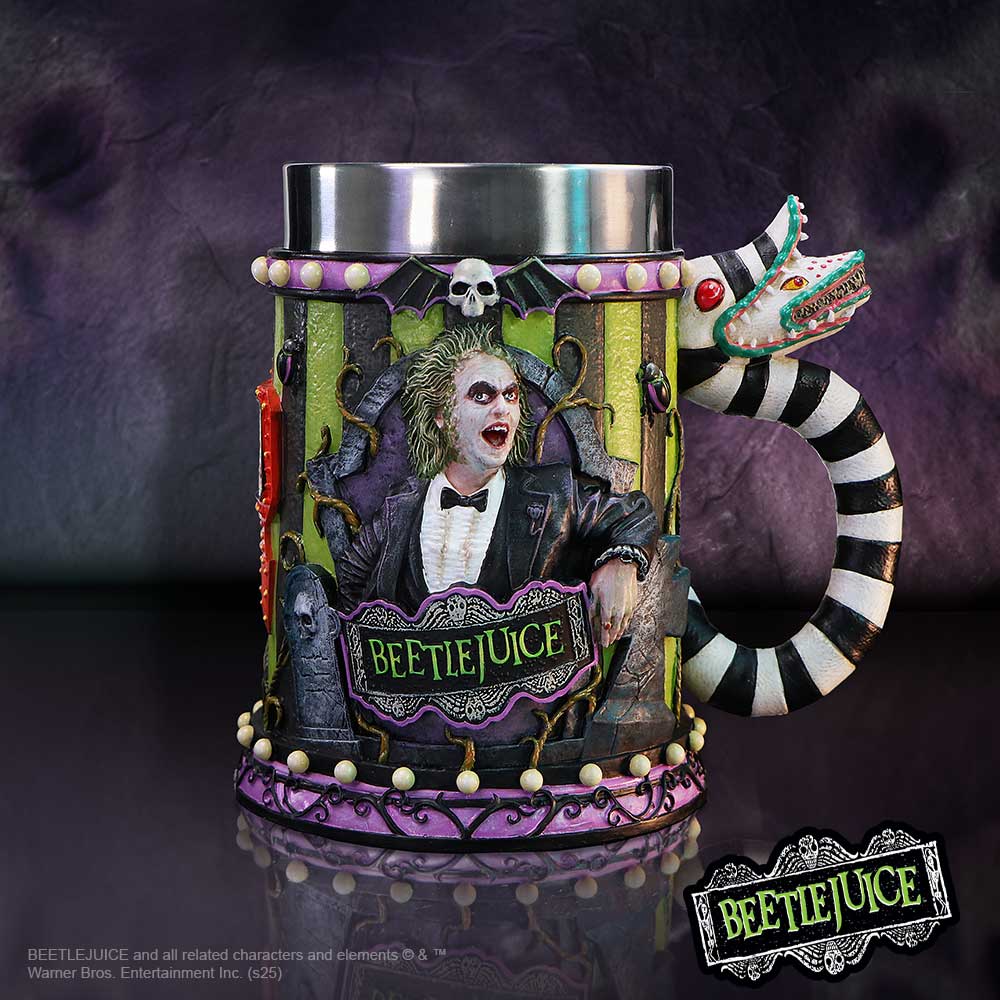 Decorative Beetlejuice mug with sculpted Beetlejuice figure and striped snake handle sits on a reflective surface against a purple textured backdrop Text: BEETLEJUICE; BEETLEJUICE and all related characters and elements © & ™ Warner Bros. Entertainment Inc. (s25)