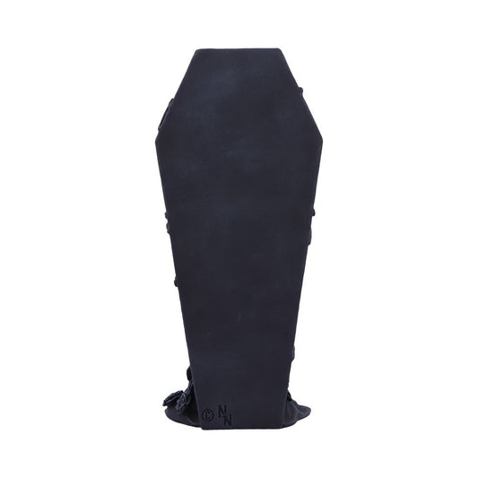 Black coffin-shaped display stands upright in a white studio background; small printed text at the base reads "© N N".