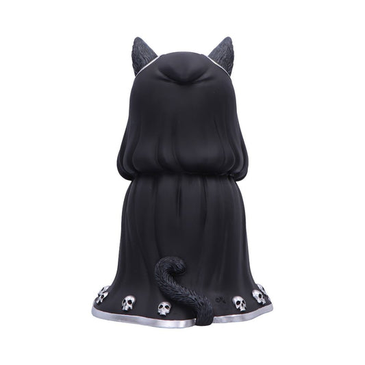 Cloaked black cat figurine sits facing away, tail curled at base, wearing a long hooded cape trimmed with silver and small skulls, photographed against a plain white background.