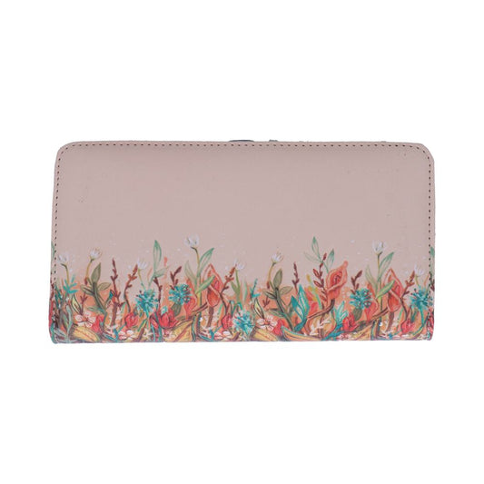 A pale pink rectangular wallet lies flat displaying a colorful floral border of red, teal, and yellow blooms and greenery along its bottom edge against a white background.