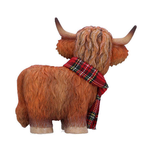Highland cow figurine stands facing away, showcasing shaggy reddish-brown fur and curved horns while wearing a red tartan scarf against a plain white background.