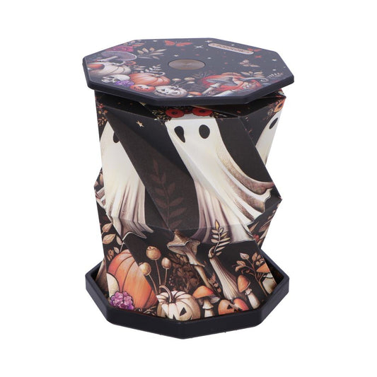 Octagonal collapsible paper lantern displays white ghost figures and pumpkins on twisted dark panels, sitting upright against a plain white background with matching octagonal lid and base.