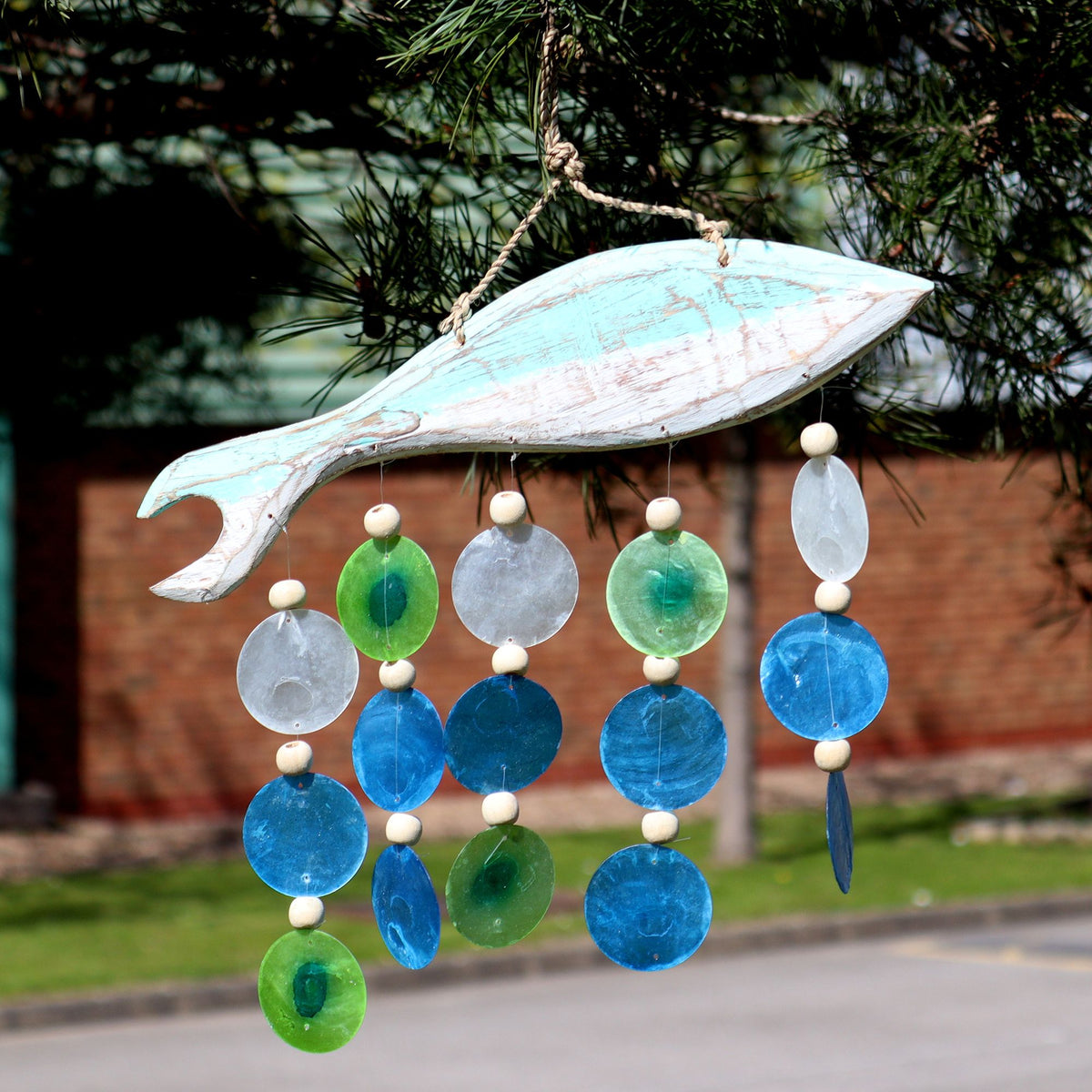 Handmade aqua fish carving windchime with colourful Capiz shell drops.