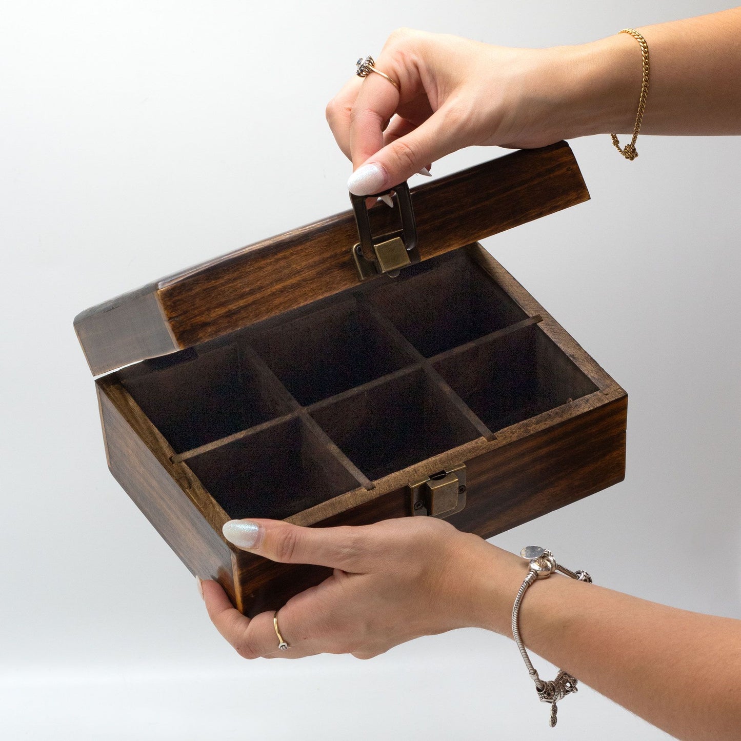 Carved Tea Box Medium mango wood tea storage box with 6 compartments and brass clasp
