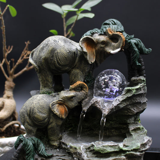 Elephant family tabletop water feature with flowing water