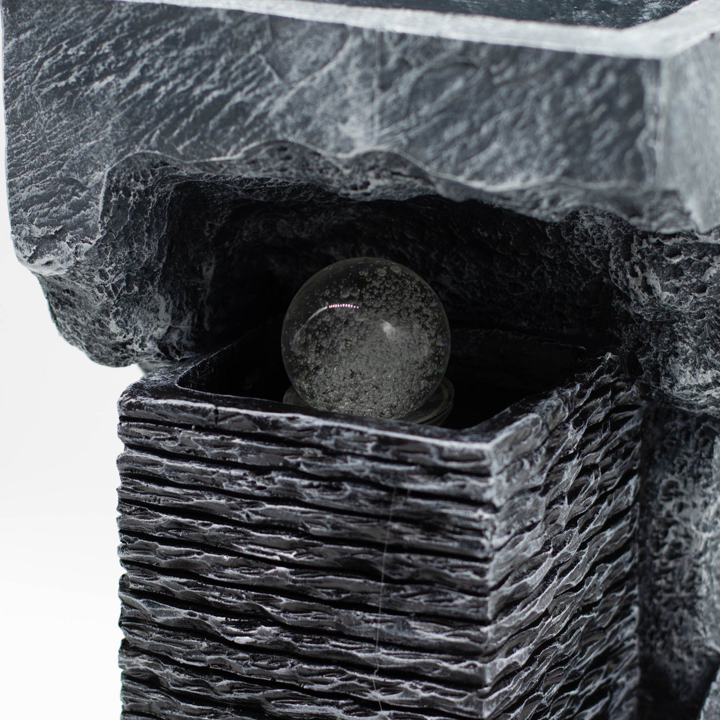Grand Colour-Changing Crystal Ball in Rock Water Feature with colour-changing crystal ball and flowing water