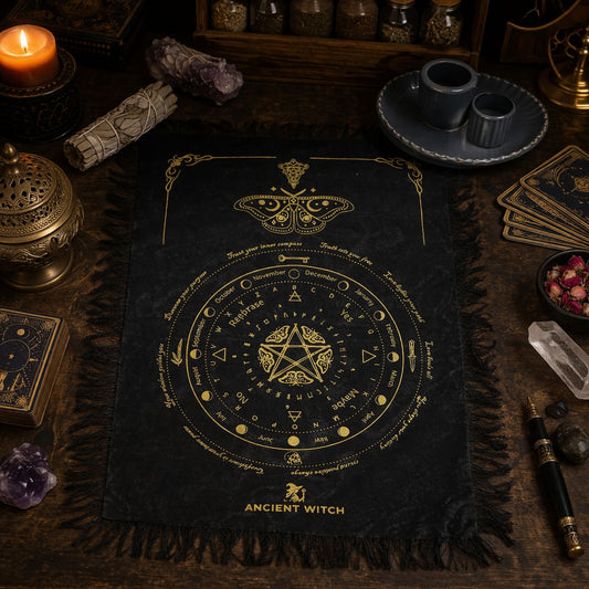 Ancient Witch Mystic Moth pendulum divination cloth in black and gold with circular reading chart and decorative fringed cotton edges