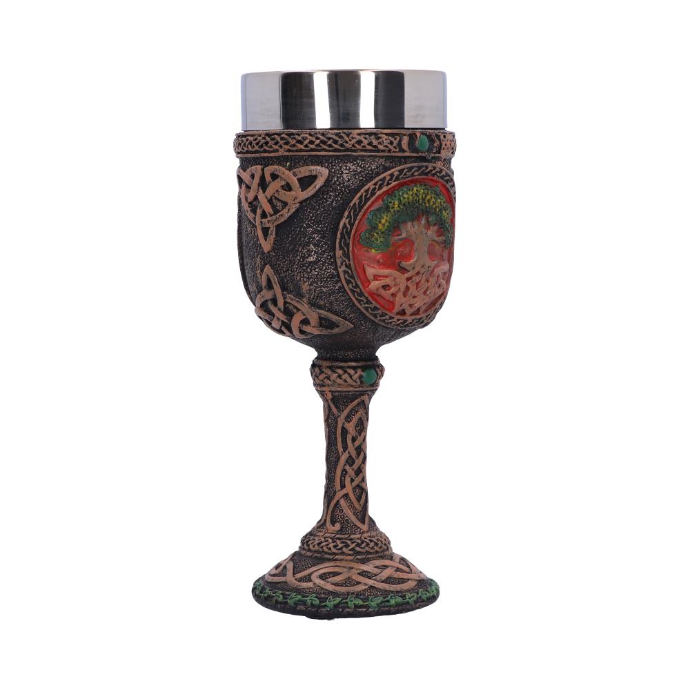 A bronze-colored goblet with a silver metal cup displays Celtic knots and a tree of life; the goblet sits on a white surface.