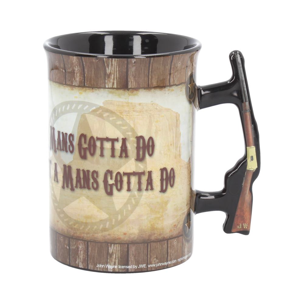 A mug with a rifle-shaped handle features text: "A MANS GOTTA DO WHAT A MANS GOTTA DO." Background has a rustic Western-style design with wooden plank motifs.