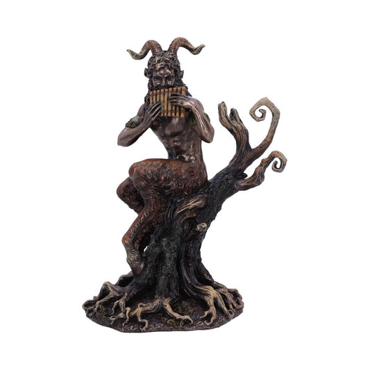 A satyr figure with goat legs and horns plays a pan flute while seated on a twisted, gnarled tree trunk with exposed roots in an isolated setting.