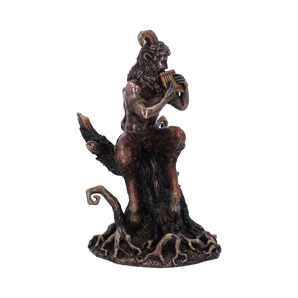 A satyr with goat features plays panpipes while seated on a twisted, root-like tree stump, evoking a mythical forest setting.