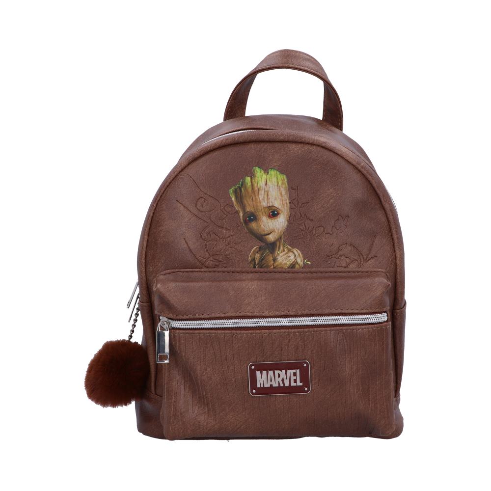 A brown leather backpack displays a Baby Groot image; it features a small, furry brown pom-pom. MARVEL is embossed on the front.