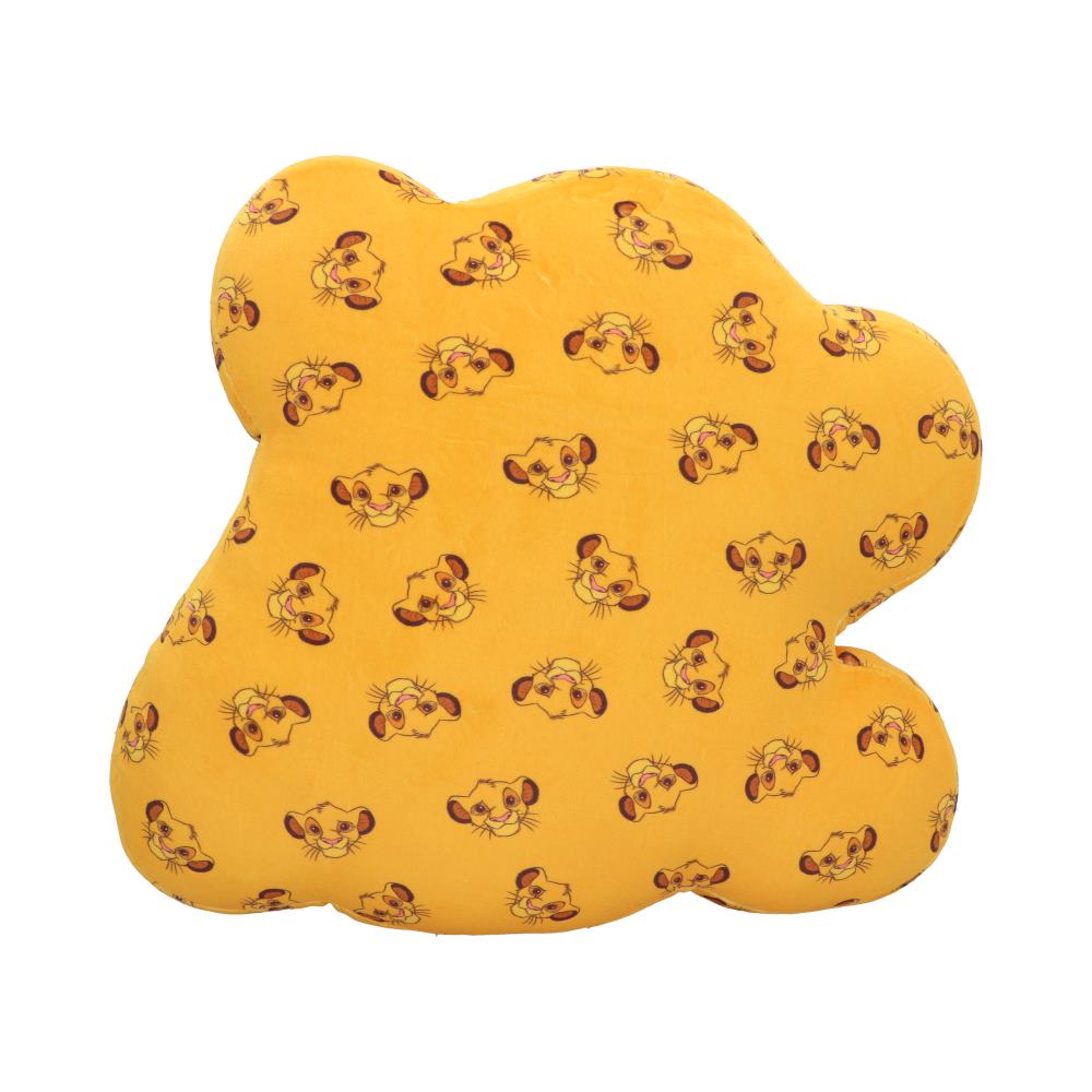 A yellow, oddly-shaped pillow is covered in a pattern of Simba's face. The pillow is resting against a white background.