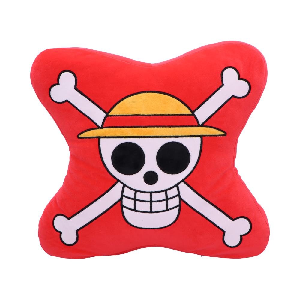 A red, X-shaped pillow features a cartoon skull and crossbones with a yellow straw hat, set against a plain white background.