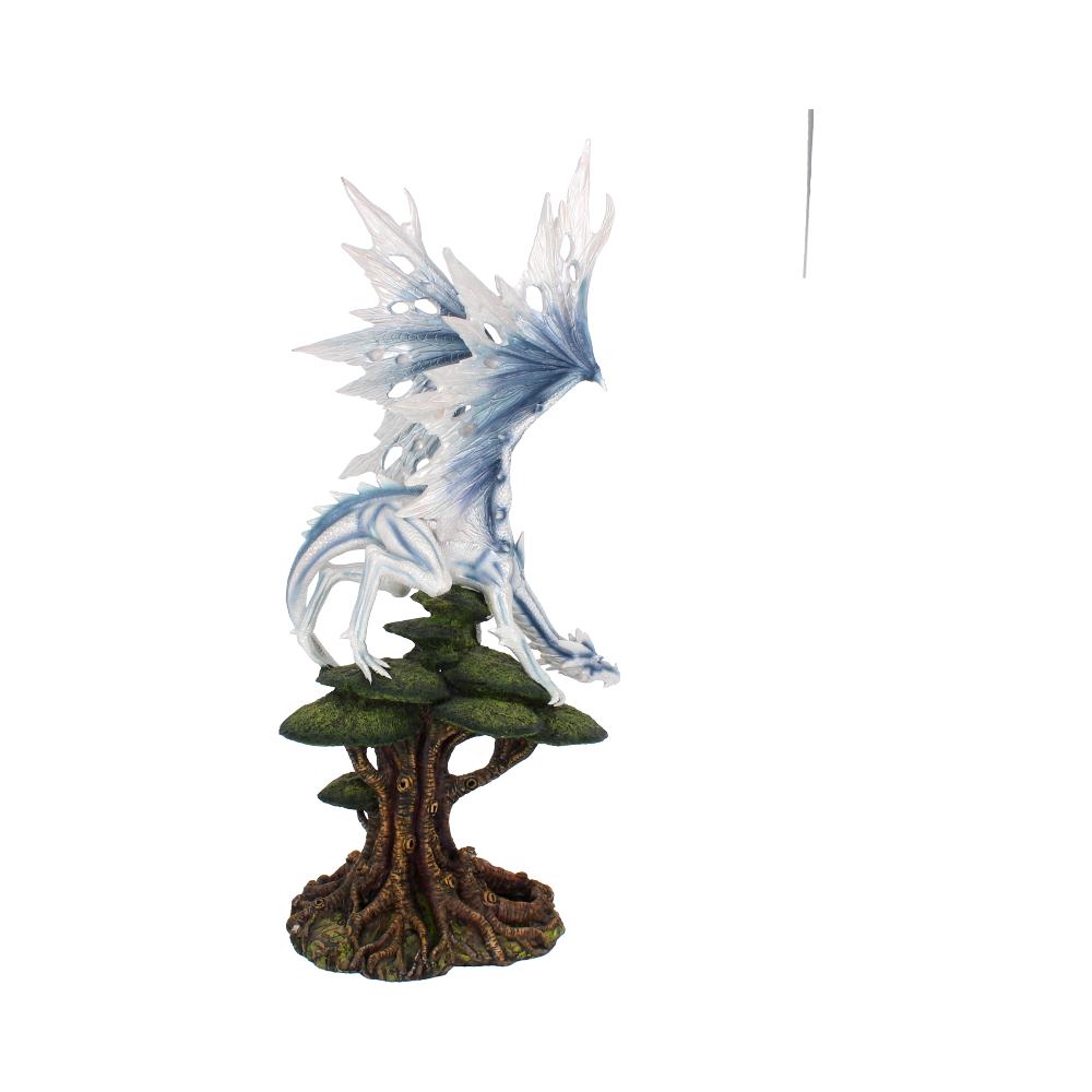 A delicate, white and blue dragon with translucent wings perched atop a detailed, twisted tree with lush green foliage, set against a plain white background.