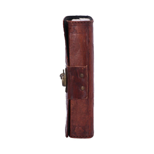 A leather-bound journal with aged brown texture is closed by a brass clasp on a white background.