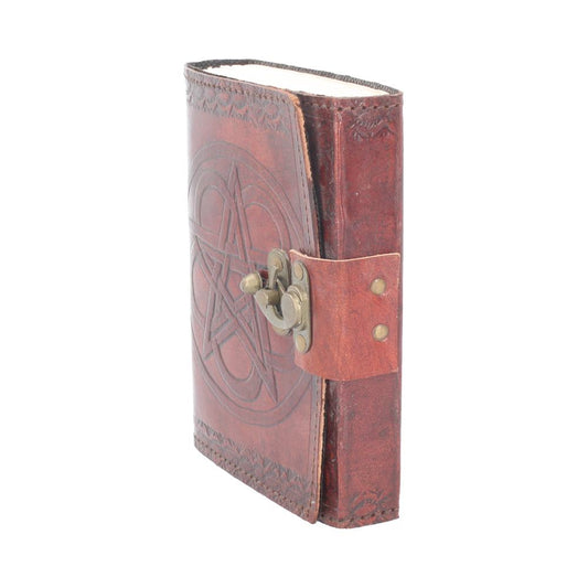 A brown leather-bound journal is displayed. The front cover features an embossed pentagram design and is secured with a metal clasp.